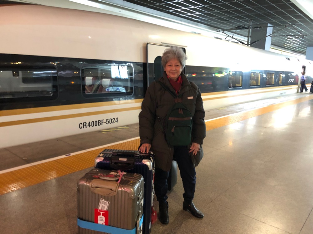 my wife in train station at hangzhou east